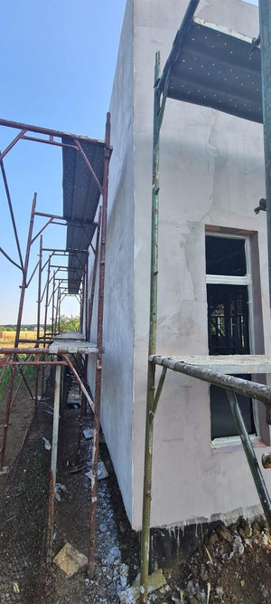 Termoizolatie exterioara vata bazaltica si masa de spaclu constructie casa de 130 mp thumbnail