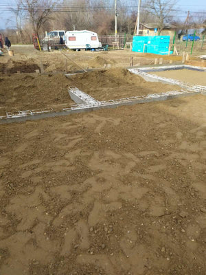 Umplerea spatiilor dintre fundatii pentru casa de 162 mp in Snagov thumbnail