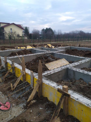 Umplerea spatiilor dintre fundatii pentru casa de 162 mp in Snagov thumbnail