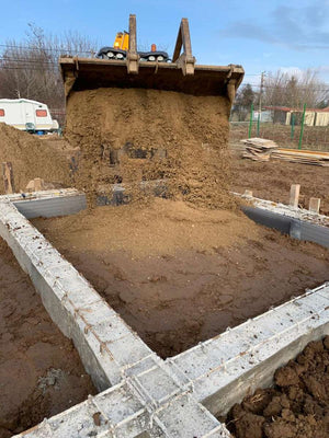 Umplerea spatiilor dintre fundatii pentru casa de 162 mp in Snagov thumbnail